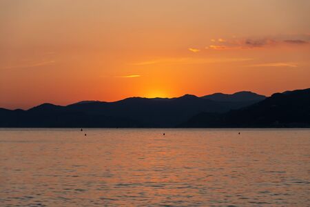 Beautiful bright sunset over the sea. Great travel view. Amazing nature paradise. Impressive summer panorama.の写真素材