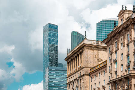 Skyscraper and historical buildings in the city, combined modern architecture.の写真素材