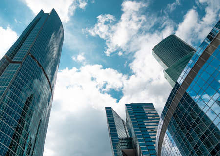 Skyscrapers in a finance district, urban city architecture, sky cloudy background.の写真素材