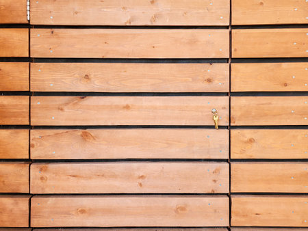 Narrow brown wood plank wall texture background. Pronounced wood texture.の写真素材