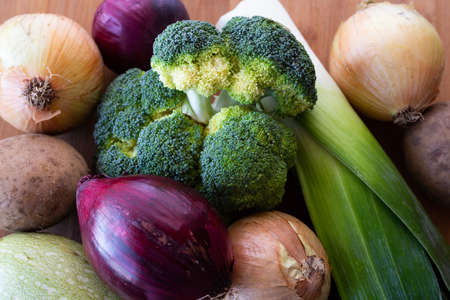 Fresh vegetables on the table, wooden background, close-upの写真素材