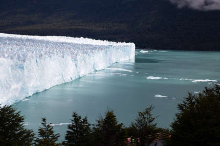 View of Perito Moreno glacier in Argentina with ice melting and floating in the water. Climate...