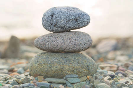 Three stones on stone to seacoastの写真素材