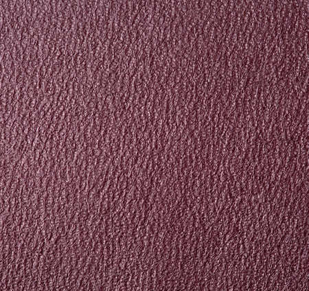 embossed texture of fresh skin dark redの写真素材