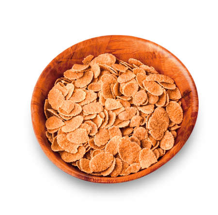wooden plate with flakes on the white background