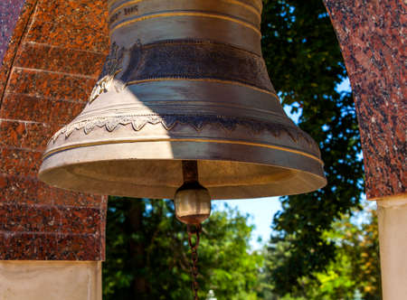 Old Bell at a military Memorial in Europeの写真素材