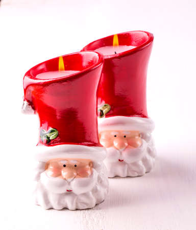 Two candles in the shape of Santa Clausの写真素材