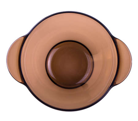 Glass plate on a white background transparent matte deep brown with two handles on each side dishes for soup. View upの写真素材