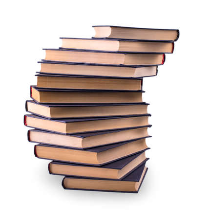 Stack of old books on the white backgroundの写真素材