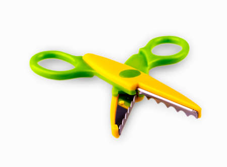 Colore opened  baby scissors cut out on a white backgroundの写真素材