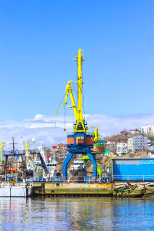 Crane in seaport in Avacha bay on Kamchatkaの写真素材
