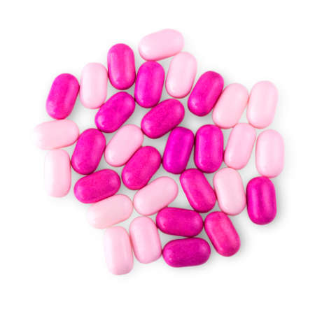 Pile of multicolored pills on white background