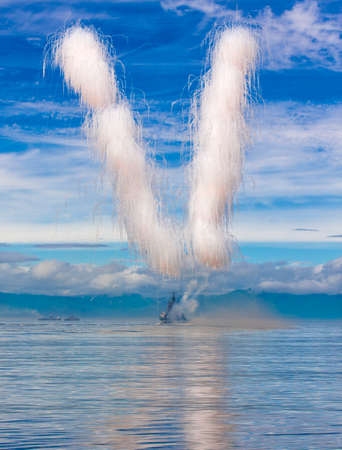 Solemn gun salvo on a military ship on Kamchatkaの写真素材