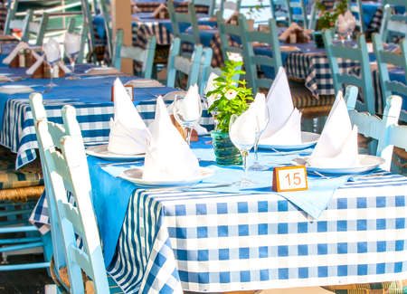 empty tables in the summer cafeの写真素材