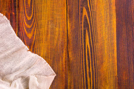 Burlap texture on wooden table background
