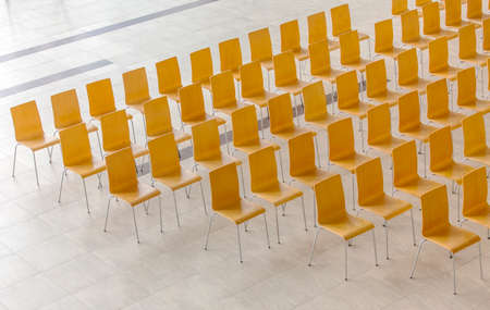 Rows of chairs - meeting background.View from above.の写真素材