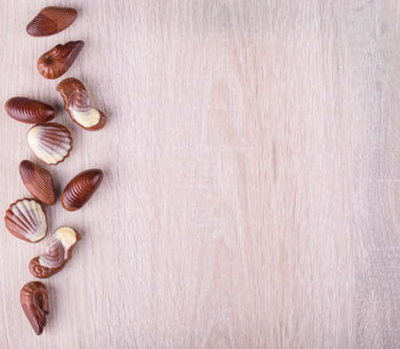 Chocolate candy desert. Chocolate candies in the form of seafoodの写真素材