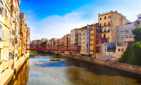GIRONA, CATALONIA / SPAIN - JUNE 17, 2018: Colorful houses in Girona