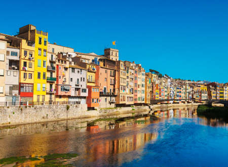GIRONA, CATALONIA / SPAIN - JUNE 17, 2018: Colorful houses in Gironaのeditorial素材