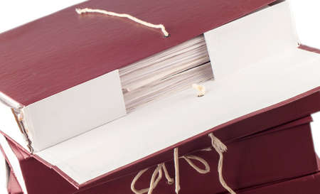 Paper documents stacked in archive isolated on white background