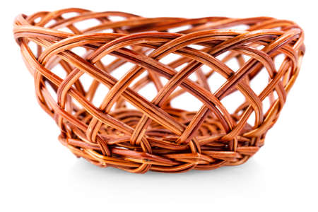 wicker brown basket bowl isolated on white background