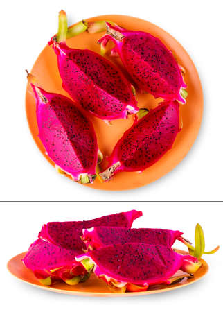 The red dragon fruit  on the plate isolated on whiteの写真素材