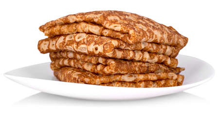 Stack of delicious pancakes on plate isolated on white. Closeup