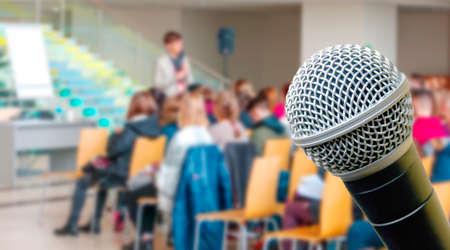 Top view of meeting room blur background and microphone, business Meeting Conference, Team learning...