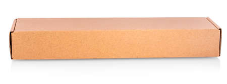 Closed cardboard box taped up and isolated on a white background.