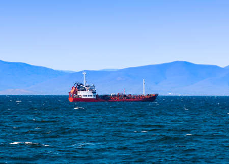The bulk cargo ship to harbor quayside Vladivostokの写真素材