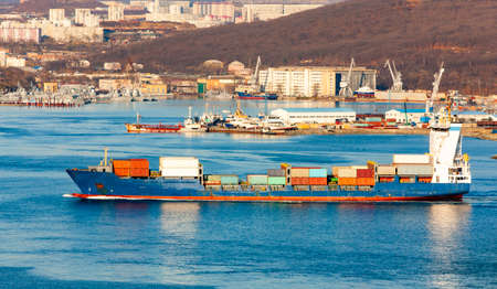 The Large container ship in the harbor
