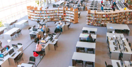 The blured students library reading room in collegeの写真素材