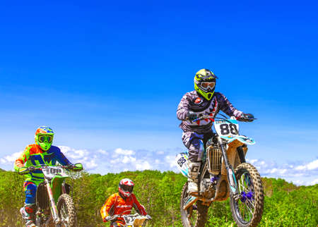 Kamchatka, Russia- 29 June 2019: Motocross riders practice tricks on their dirt bikes on a sunny day in Kamchatkaのeditorial素材