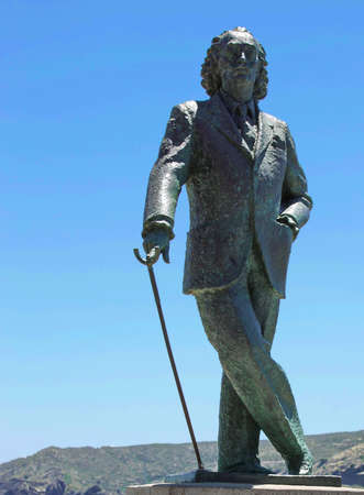 Cadaques, Spain - June 16, 2018: The bronze life-size statue to famous Salvador Dali in Spainのeditorial素材