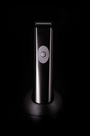 The hair trimmer closeup on a black backgroundの写真素材