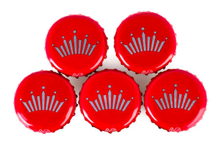 Kamchatka, Russia - 19 May 2018: Red beer caps Bud. From Anheuser-Busch InBev, Budweiser and Bud...