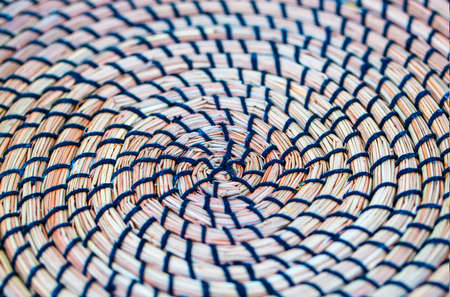 The Wicker plate holder.Details of wicker plate. Selective focusの写真素材