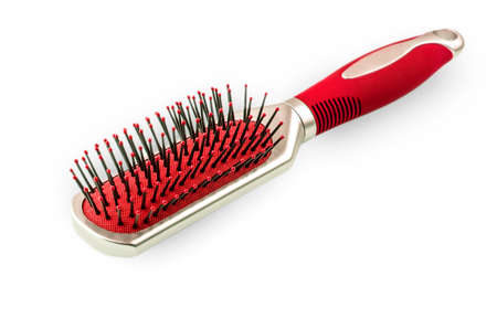 Massage red comb isolated on white backgroundの写真素材