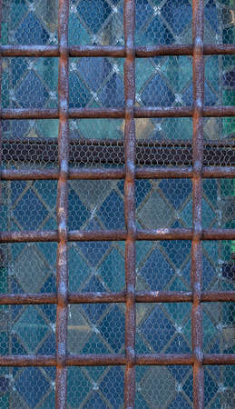 close up window with iron grating . Selective focusの写真素材