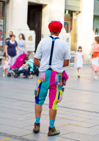 The Street clown in a busy pedestrian street in the heart of Belgrade entertains passers-by and childrenのeditorial素材