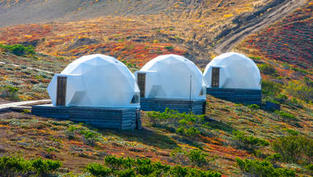 White glamping on the slope of a volcano in autumn on the Kamchatka Peninsulaの写真素材