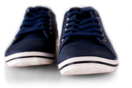 blue mens summer sneakers isolated on white. Selective focusの写真素材