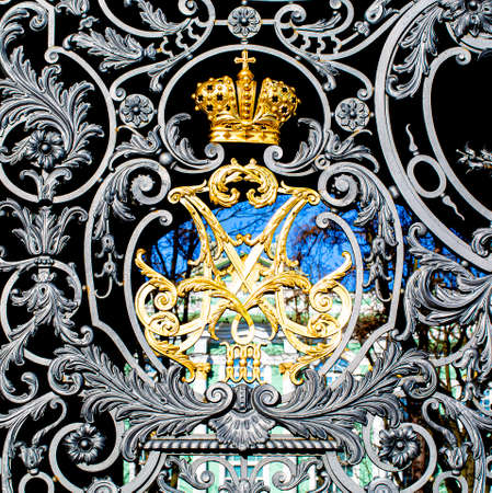 Golden imperial crown of Russian empire monogram at Winter Palaceの写真素材