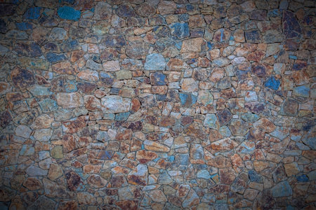 Texture of a stone wall. Old castle stone wall texture background. Stone wall as a background or...