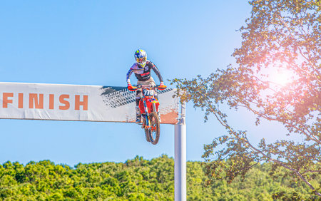 Motorcyclist jumps at the Russian Motocross Championship in Kamchatkaのeditorial素材