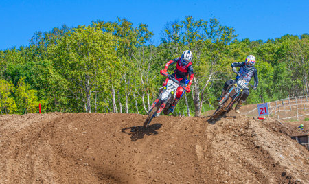 The motorcyclist jumps at the Russian Motocross Championship in Kamchatkaのeditorial素材