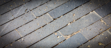 Paving blocks made of asymmetrical stone. Selective focus