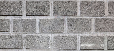 Grungy texture as briks, grey concrete wall