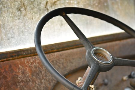 Steering Wheel and Dashboard from an old rusty car or truckの写真素材