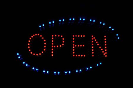 Open Neon Sign in Blue Red and Black